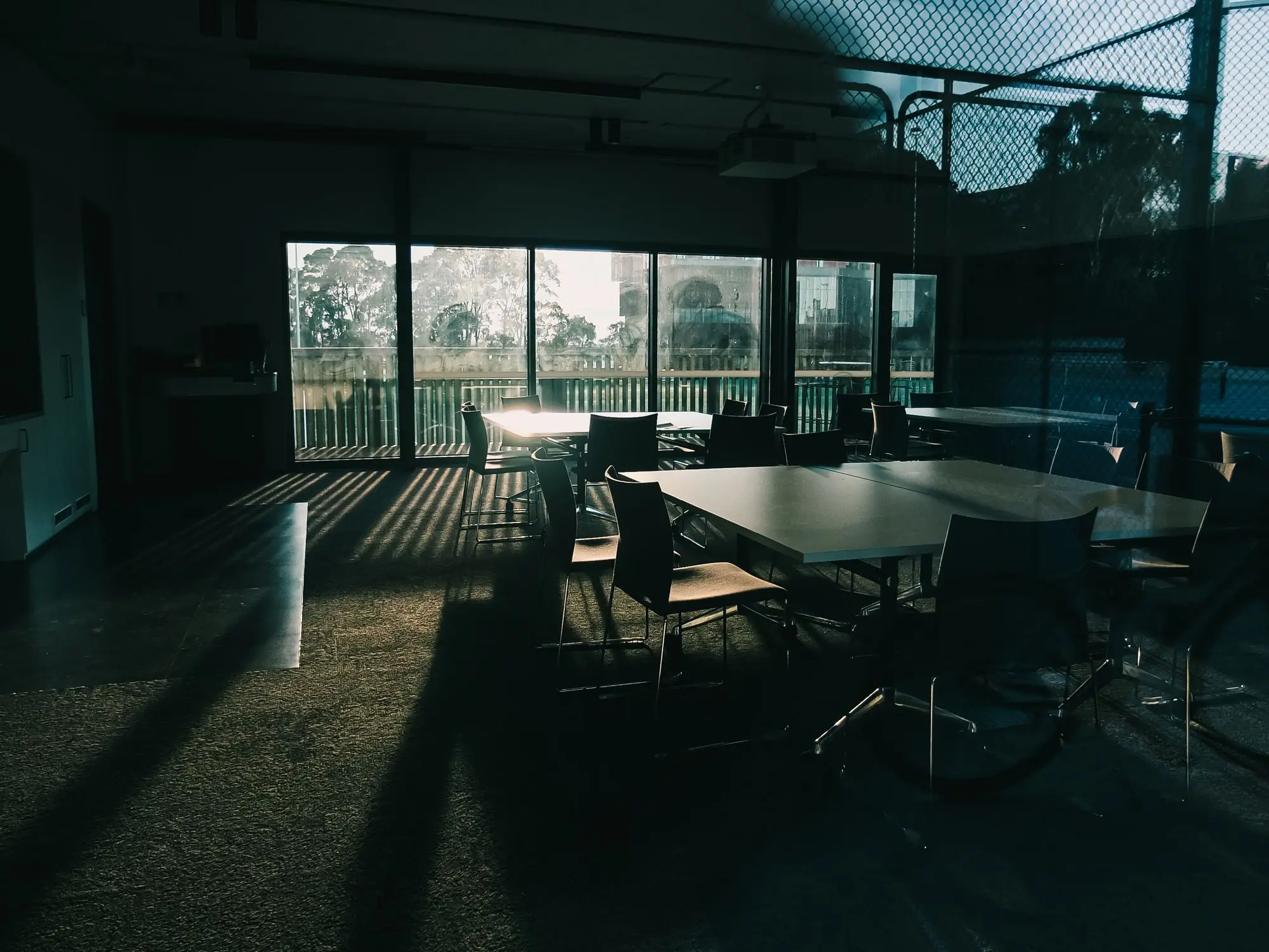 An empty conference room in afternoon sunlight